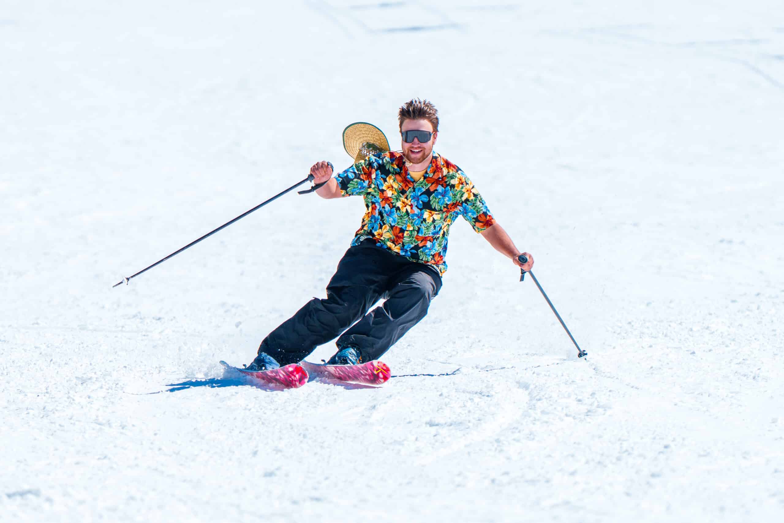 Skier during World's Best Spring Break wearing a Hawaiian shirt at Snowbowl.