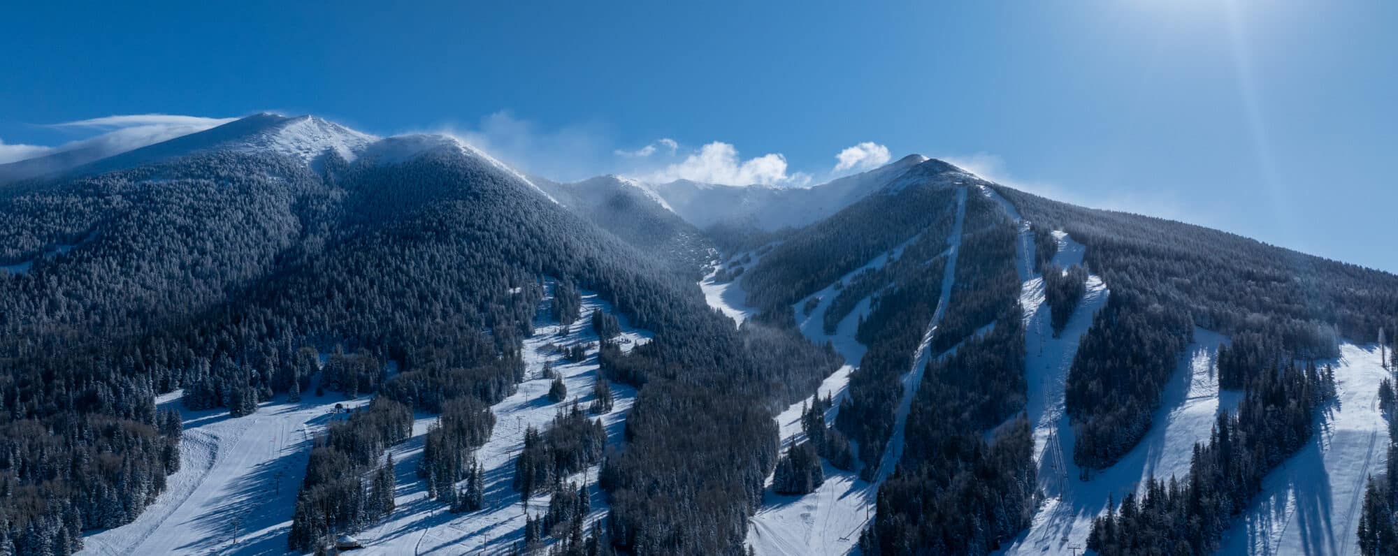 Aerial view of Snowbowl's peaks after a winter storm.