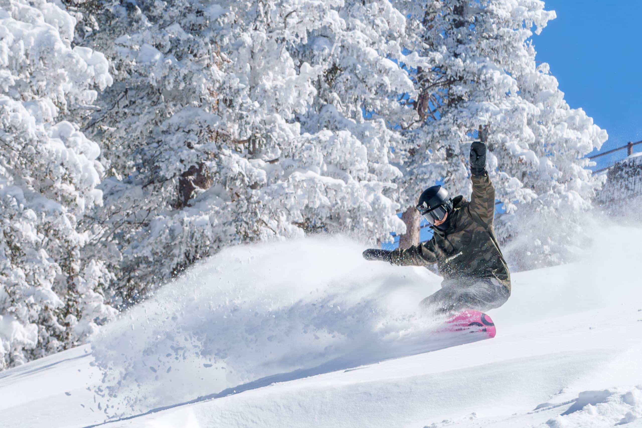 Snowboarder in Powder at Snowbowl